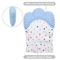 Baby mitt with colorful polka dots and blue textured top, featuring adjustable velcro strap and 100% food grade silicone.