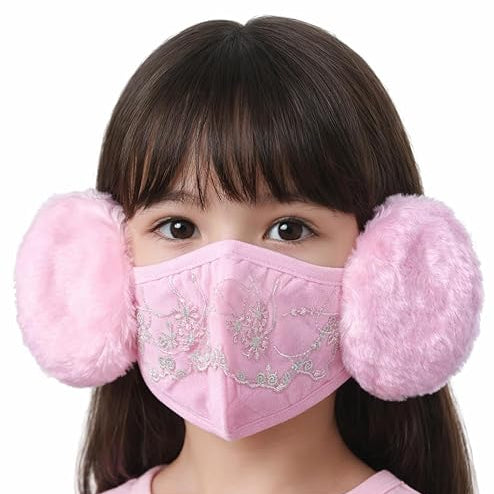 Child wearing a pink face mask with floral design and matching pink fluffy earmuffs on a white background