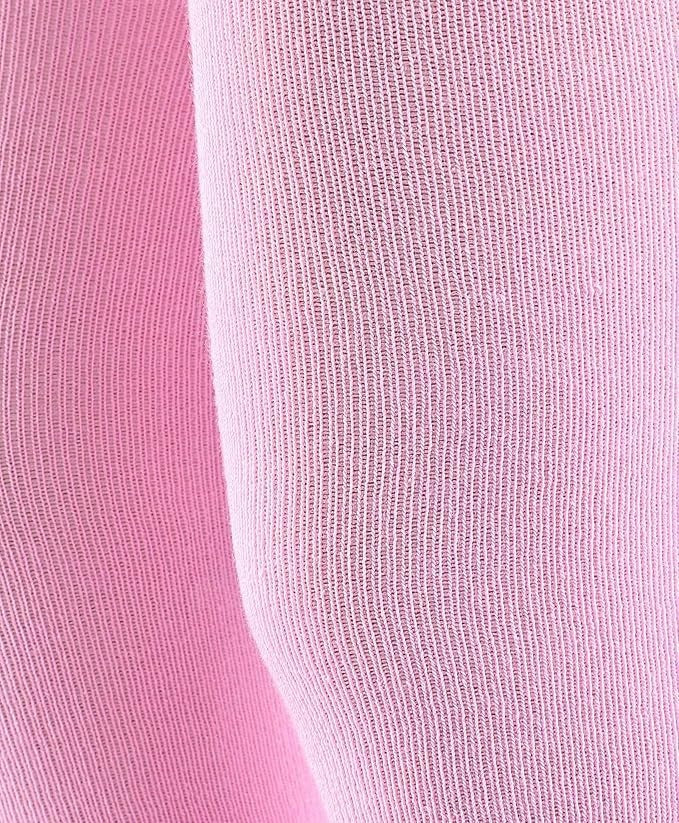 Close-up of pink and white socks with a textured pattern.