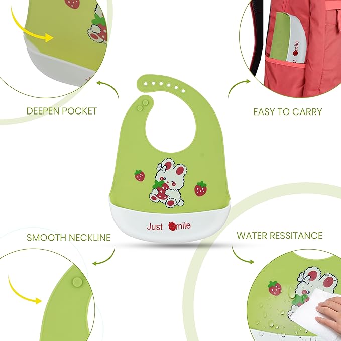 Green baby bib with cartoon design and text on a white background