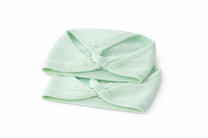 Light green headband with a twisted design on a white background