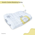 Muslin cotton burping hank with cartoon design on a white background