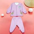 Purple baby outfit with cartoon designs on a pink background
