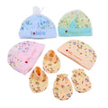 Set of baby hats and booties with colorful patterns on a white background
