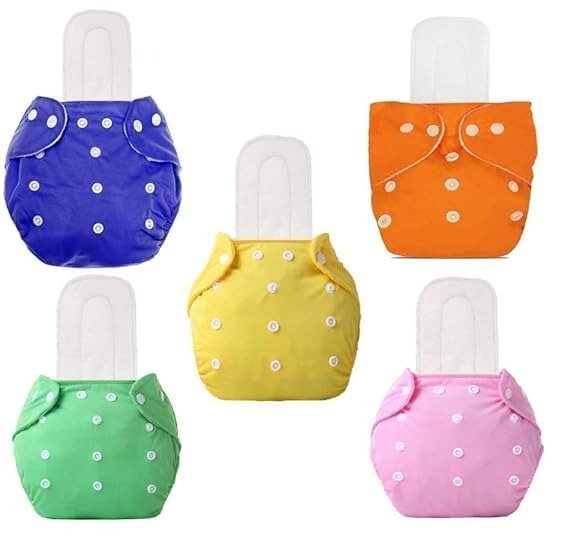 Set of colorful cloth diapers with white button details on a white background