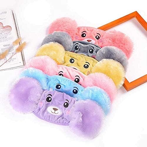 Set of colorful eye masks with cartoon faces on a white background