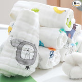 Stack of baby diapers with cartoon designs on a white surface, labeled '6 pack' and 'WooAttire'.