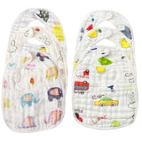Two baby shoe inserts with colorful cartoon designs on a white background