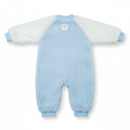 Blue baby onesie with white sleeves on a white background