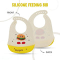 Silicone feeding bib with cartoon burger design on a white background