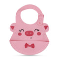 Pink cartoon-style bib with pig design on a white background