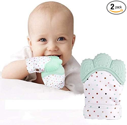 Baby wearing a mint green and white polka dot teething product with another similar product next to it on a white background.