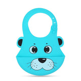 Blue silicone bib with cartoon dog face design on a white background